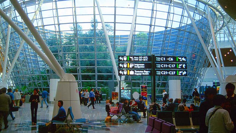 kul kuala lumpur international airport with tropical rainforest